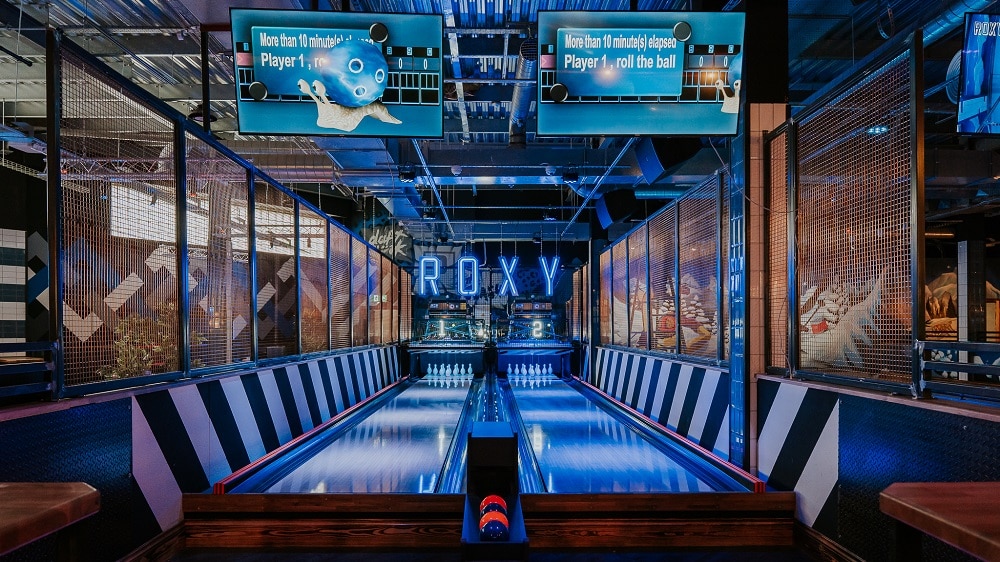 Game activities at Roxy Lanes in Bristol - Duck pin bowling, batting cage, ten pin bowling, ice free curling, American pool and a photo booth