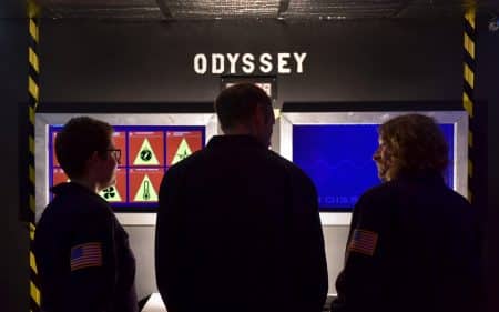 3 people inside the Operation Odyssey room at Can you escape?